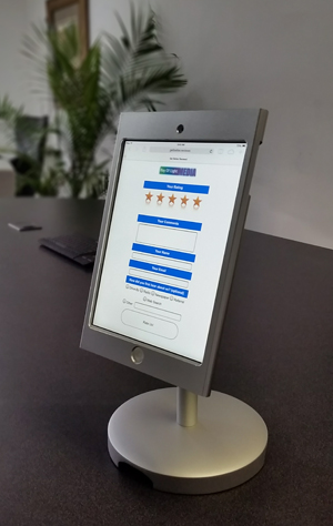 picture of a tablet with a review form